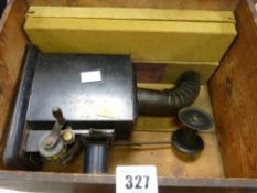 Box of vintage film projector with animated film of 'Zeppelin in Flight'