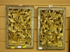 Two carved gilt wood plaques