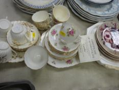 Mixed teaware and a series of Royal Worcester display plates