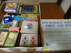 Boxed household ARP first aid kit by Johnson & Johnson and a box containing large quantity of