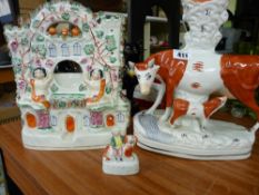 Three Staffs pottery ornaments; spillholder, watch-holder etc