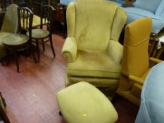 Antique style wingback armchair with matching footstool