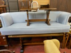Antique sofa with neat light blue upholstery