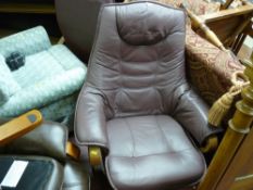 Burgundy coloured leather effect swivel armchair