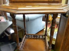 Hexagonal topped occasional table with lower galleried shelf