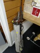 A collection of vintage fishing rods & golf clubs