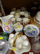 A quantity of mixed pottery & china including commemorative items, an egg cup caddy etc