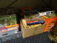 A large quantity of various jigsaw puzzles