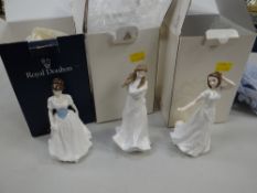 Three boxed Royal Doulton figurines - 'Melody' HN4117, 'Embrace' HN4258 & 'Charmed' HN4445