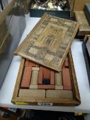 A child's 1880 wooden boxed architectural building-blocks set