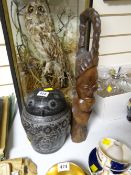 A sgraffito decorated lacquer ware owl container together with a sub Saharan African Carved figure