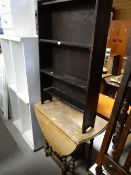 A small drop leaf gate-leg side table together with a dark wood bookcase