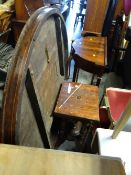 An oval inlaid tilt-top dining table (distressed)
