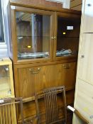 A G-Plan dark wood lounge display cabinet with pull down front