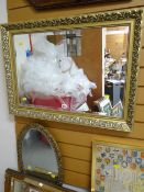 A reproduction gilt framed bevelled wall mirror & another oval
