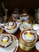 A quantity of Edwardian rust & gilt decorated teaware & a quantity of eggshell teaware