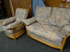 A two-seater light wood Ercol settee & matching armchair