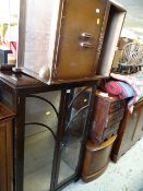 A vintage glass two-door display cabinet together with a bedside cabinet