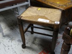 A rush seated oak stool