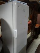 An Indesit upright fridge in white E/T
