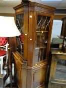 Two reproduction mahogany standing corner cupboards with glazed display top & cupboard base