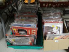 A large quantity of unopened Elvis Presley collector's magazines
