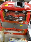 Three boxed classic sports cars & an unboxed Jaguar