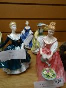 Four Royal Doulton figurines - 'Alexandra' HN3292, 'Buttercup' HN2309, 'Janine' HN2461 & 'Hillary'