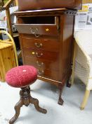 Reproduction mahogany six-drawer music cabinet on raised ball & claw feet together with a small