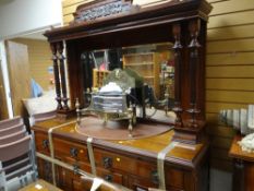A good Edwardian mahogany mirror back sideboard composed of three-drawer base with four cupboard