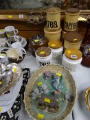 A collection of late twentieth century kitchen provision containers, a Beswick flan dish & sundry