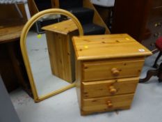 Small three-drawer pine bedside chest together with a bamboo framed arch-top wall mirror