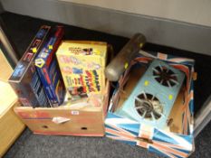 An antique French paraffin / spirit table top stove & a box of games etc