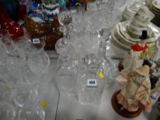 Four cut glass decanters