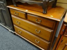A reproduction chest of two long & two short drawers