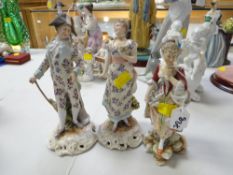 Three Continental porcelain figures (damage)
