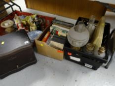 A Remy Martin wooden liquor box & a quantity of books & oil lamps etc