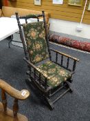 An American-style semi-upholstered sprung rocking chair (distressed)