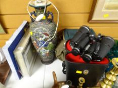 A cased set of binoculars, cameras etc