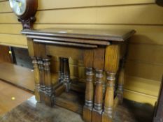 A nest of oak tables