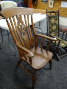 A good Elm farmhouse elbow chair with nicely shaped back