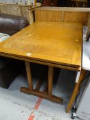 A vintage draw leaf dining table