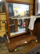 An early twentieth century mahogany toilet mirror