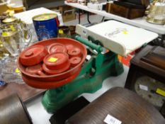 A set of vintage scales with pottery dish