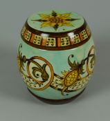 A SMALL DOULTON LAMBETH POTTERY LIDDED TOBACCO JAR in the Arts & Crafts-style with floral decoration