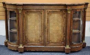 A VICTORIAN BURR WALNUT & MARQUETRY CREDENZA having a two door centre cabinet flanked by reeded