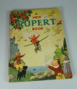 A NEW 'RUPERT BOOK' dated 1945, being a Daily Express publication with 'Book Production War