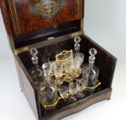A NAPOLEON III PERIOD WALNUT MARQUETRY LIQUOR CABINET having a folded hinged lid & flanking