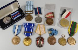 A PARCEL OF UNNAMED MIXED MEDALS including UN