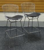 A PAIR OF CHROME WIRE WORK HIGH STOOLS in the style of Harry Bertoia, being of curved & shaped